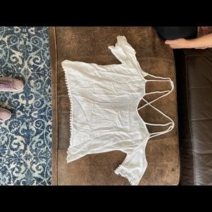 White, spaghetti strap crop top, open back, good condition.